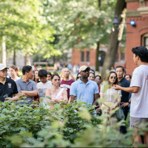 person standing in front of a crowd