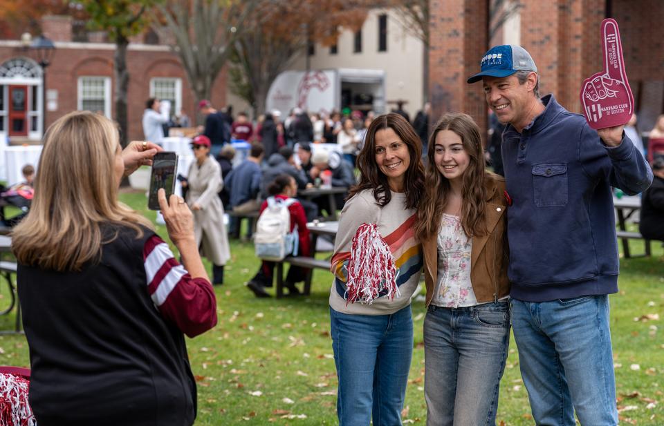 Family taking a picture at the Family Weekend Block Party