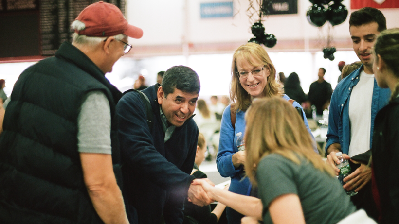 Parents meeting each other at Family Weekend